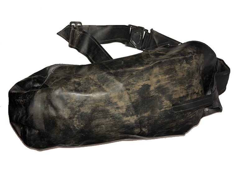 The Dark Tower The Gunslinger Shoulder Bag: Production-made black shoulder bag used by actor Idris Elba as the last Gunslinger, Roland Deschain, in The Dark Tower from 2017. Roland carried a bag with ammunition and equipment, this bag is a stun