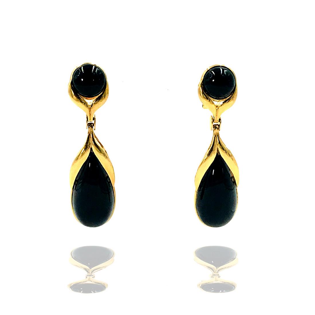 Black Onyx 2 Inch Long Dangle Earrings, Omega Backs: Retail: $1100 14 karat yellow gold, hanging oblong black onyx earrings with secure omega backings. The two piece earring consists of a round and pear shape onyx. The length of the earring is 2 inches.