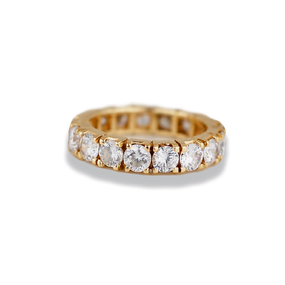 Eternity Band, 14 Karat, Quality 3.30 TCW: Eternity Band, 14 Karat, Quality 3.30 TCW GIA Gemologist quality inspection of this high-quality Brilliant white stone, ring set in low basket, 4-prong setting < Weight of gold is 5.1 grams and finger