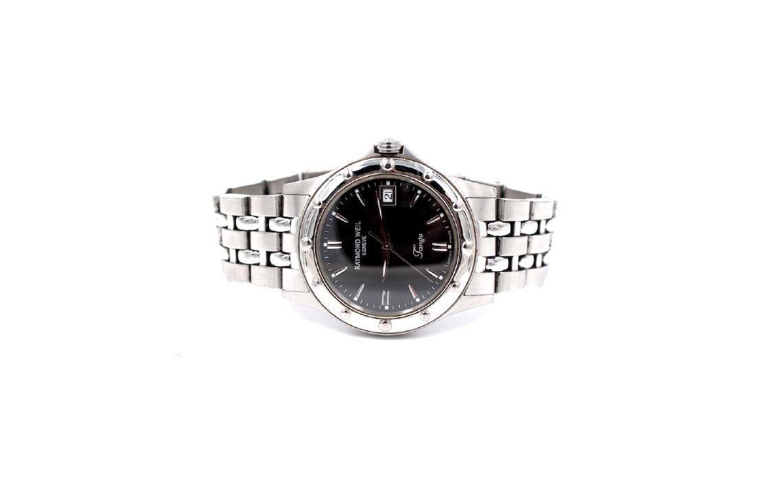 Raymond Weil Genève Tango 40mm, Sapphire Quartz Watch: Raymond Weil Genève Tango 40mm, Sapphire Quartz Watch Classic stainless steel with marker bezel 40 mm wide on deployment bracelet. Size 7 strap length wrist Quartz movement, black dial. Raymond Weil,