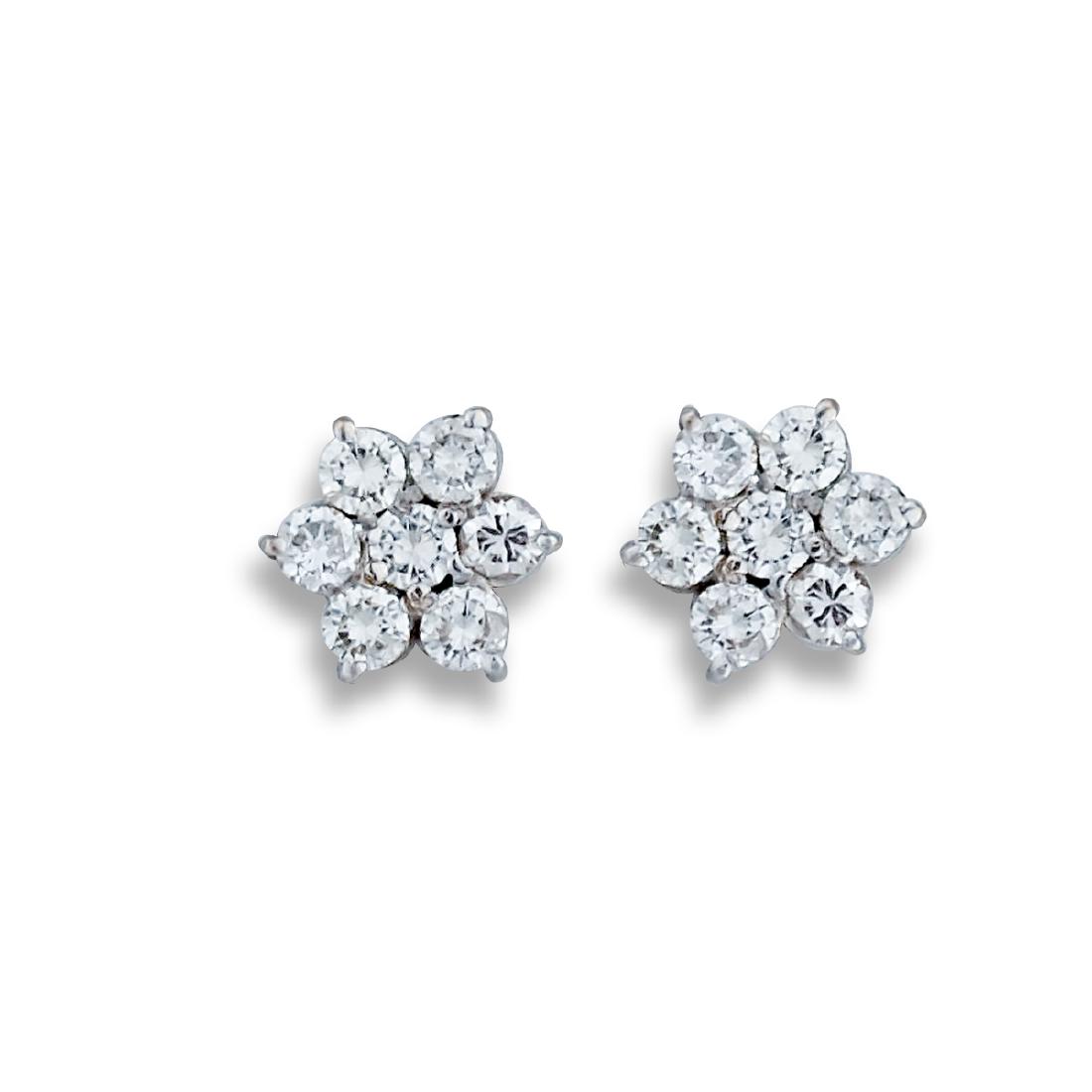 Sparkling, Diamond 1.30 TCW, Cluster Earrings, 14 Karat: Sparkling, Diamond 1.30 TCW, Cluster Earrings, 14 Karat White Gold<(88) round brilliant cut diamonds set in prongs measuring 1.65 mm. The weight of the diamonds is 1.30 carats approximately Quality of