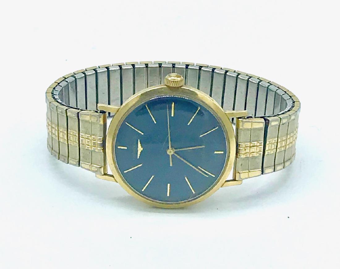 LONGINES, Swiss Automatic 1950's, Vintage 33 mm. Watch: LONGINES, Swiss Automatic 1950's, Vintage 33 mm. Watch Dark Gray dial with gold stick markers; automatic movement; gold filled casing. Working condition. Metal strap (not original). Plastic crystal Co