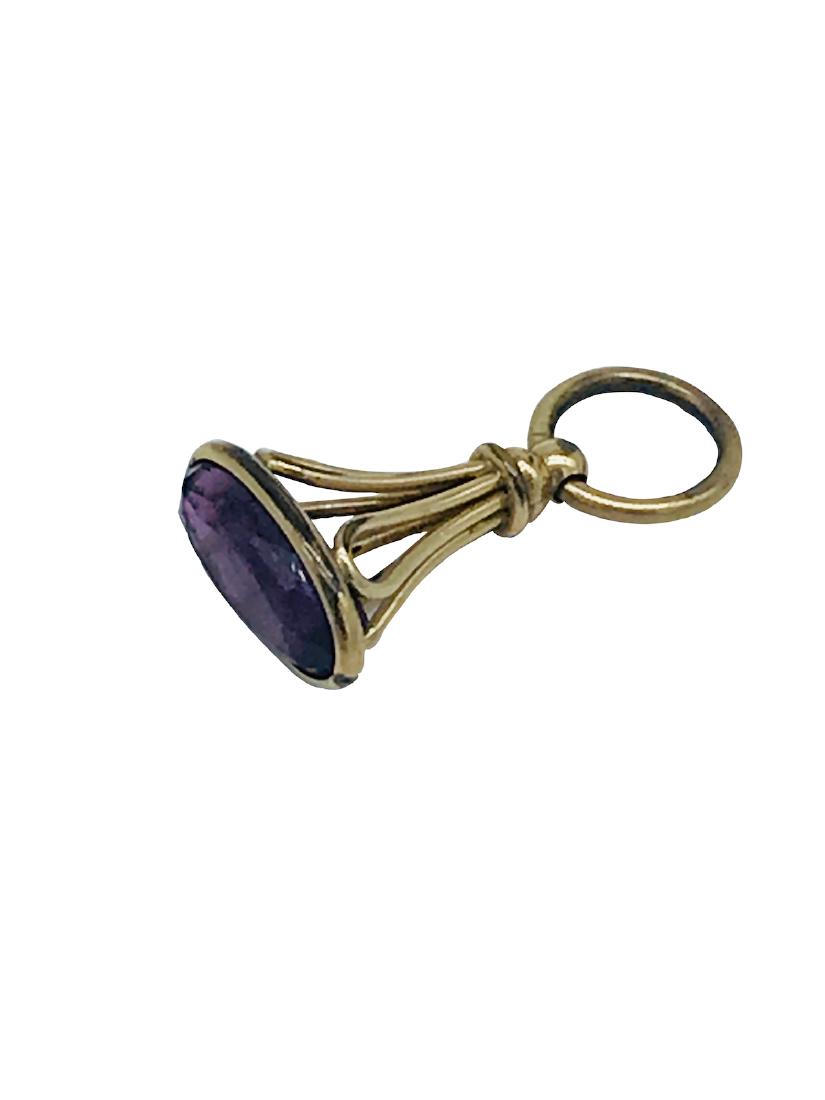 Victorian, Amethyst 1-3/4 Inch Bobble, Art Nouveau: Victorian, Amethyst 1-3/4 Inch Bobble, Art Nouveau Drop Drop Measures 1-3/4 x ¾ wide with large loop for hanging. Amethyst is a oval shaped faceted, bezel set stone measuring 20 x 40 mm in diameter w