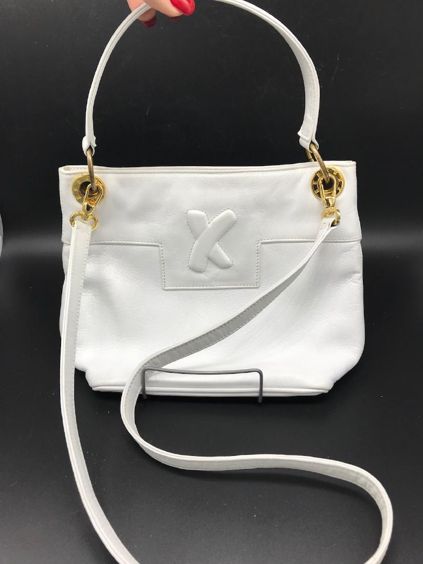 Stylish Paloma Picasso, White Leather, Small Purse,: Paloma Picasso, White Leather, Small Purse. Gold Hardware, beige inside lining. Excellent condition.