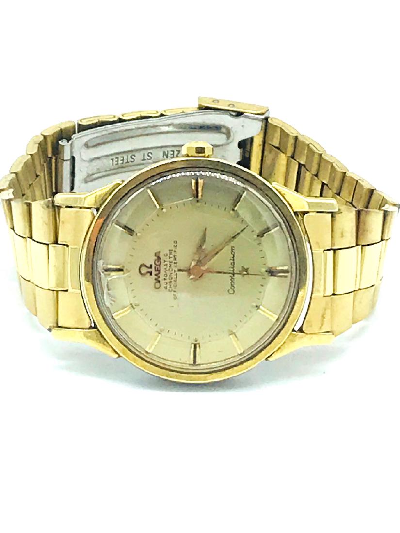 Vintage, Omega Automatic Constellation Chronometer: Vintage, Omega Automatic Constellation Chronometer Watch Circa 1950'watch with gold casing, gold stick numbers, beige dial, original crown, non-original strap with deployment buckle 34mm case (without