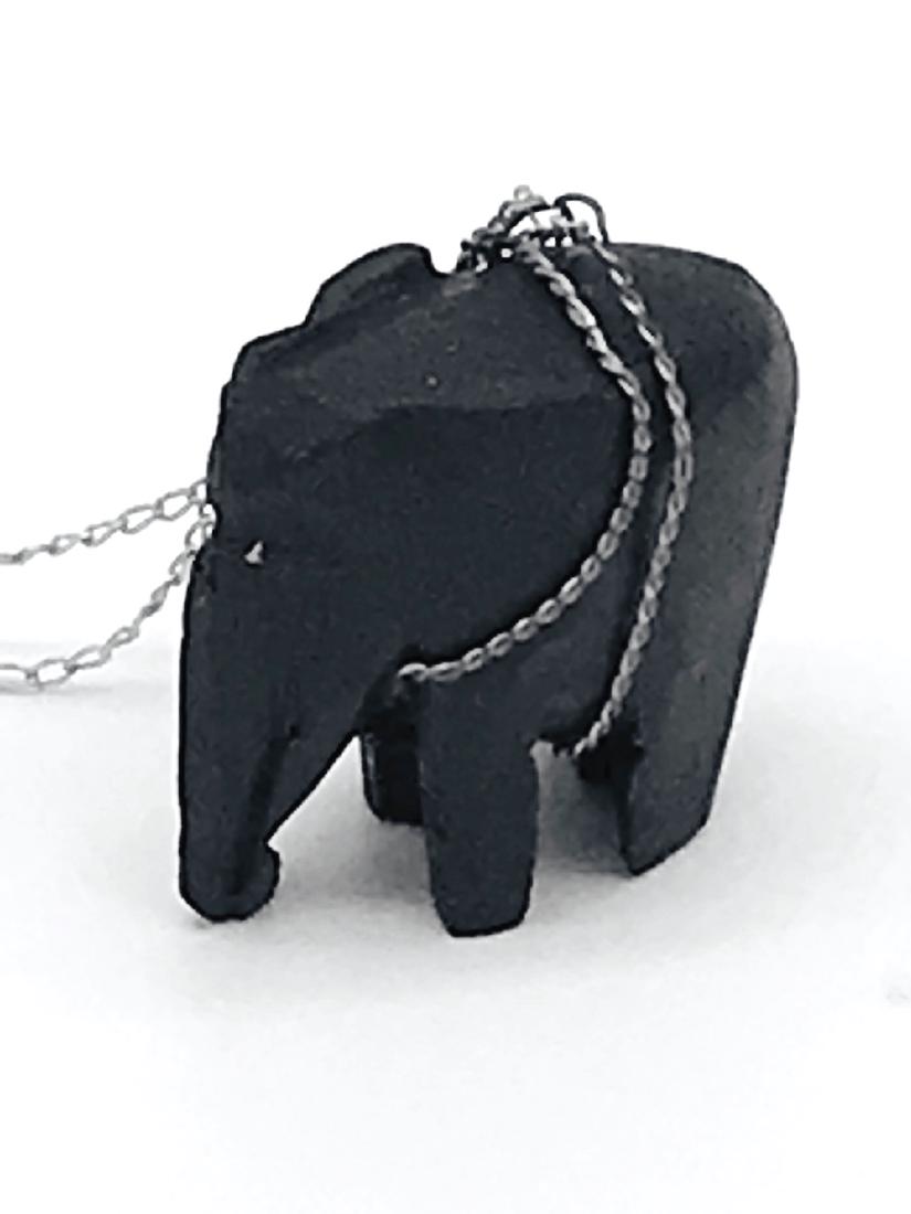 Modern, African Ebony Elephant Sterling With Chain,: Modern, African Ebony Elephant Sterling With Chain, 1972 1 inch in diameter black hand carving suspended by a chain 24 inches in length