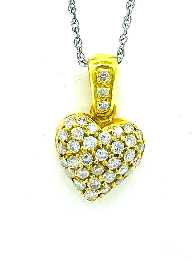 Pave 1 CT Diamond Heart, 18Kt Pendant: Pave Diamond Heart, 18Kt Pendant 3/4 inch length bubble, convex shaped heart diamond pendant consisting of 37 round pave-set diamonds. Diamonds are 1.8 mm or .025 points each. Total diamond weight is