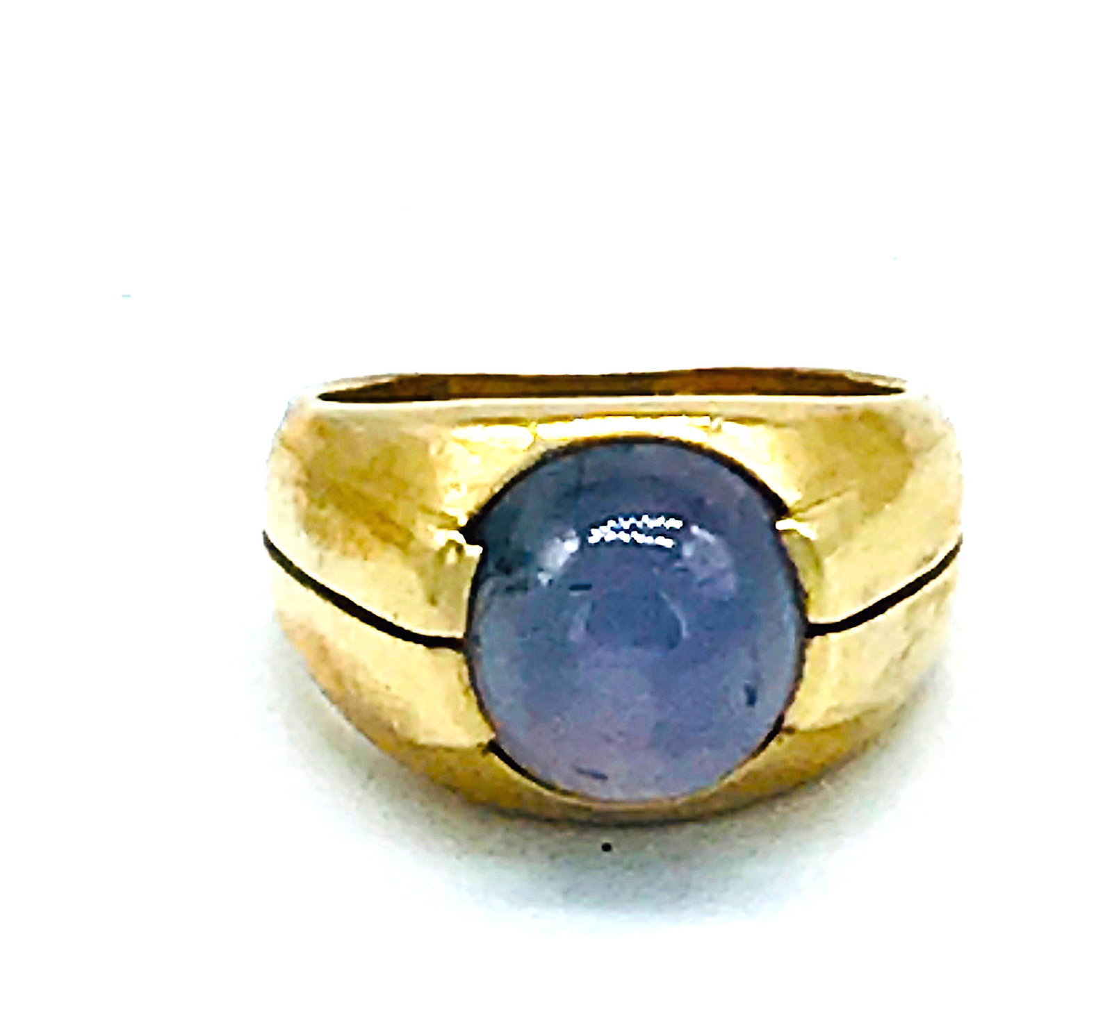 Purple Star Sapphire 9.30 Carats, Cabochon Cut, Ring: Purple Star Sapphire 9.30 Carats, Cabochon Cut RingRing is 13.55 mm wide with a rare color, purple star sapphire bezel set in this retro era ring. Hallmarked 9.30 is the weight of the gemstone and 14 