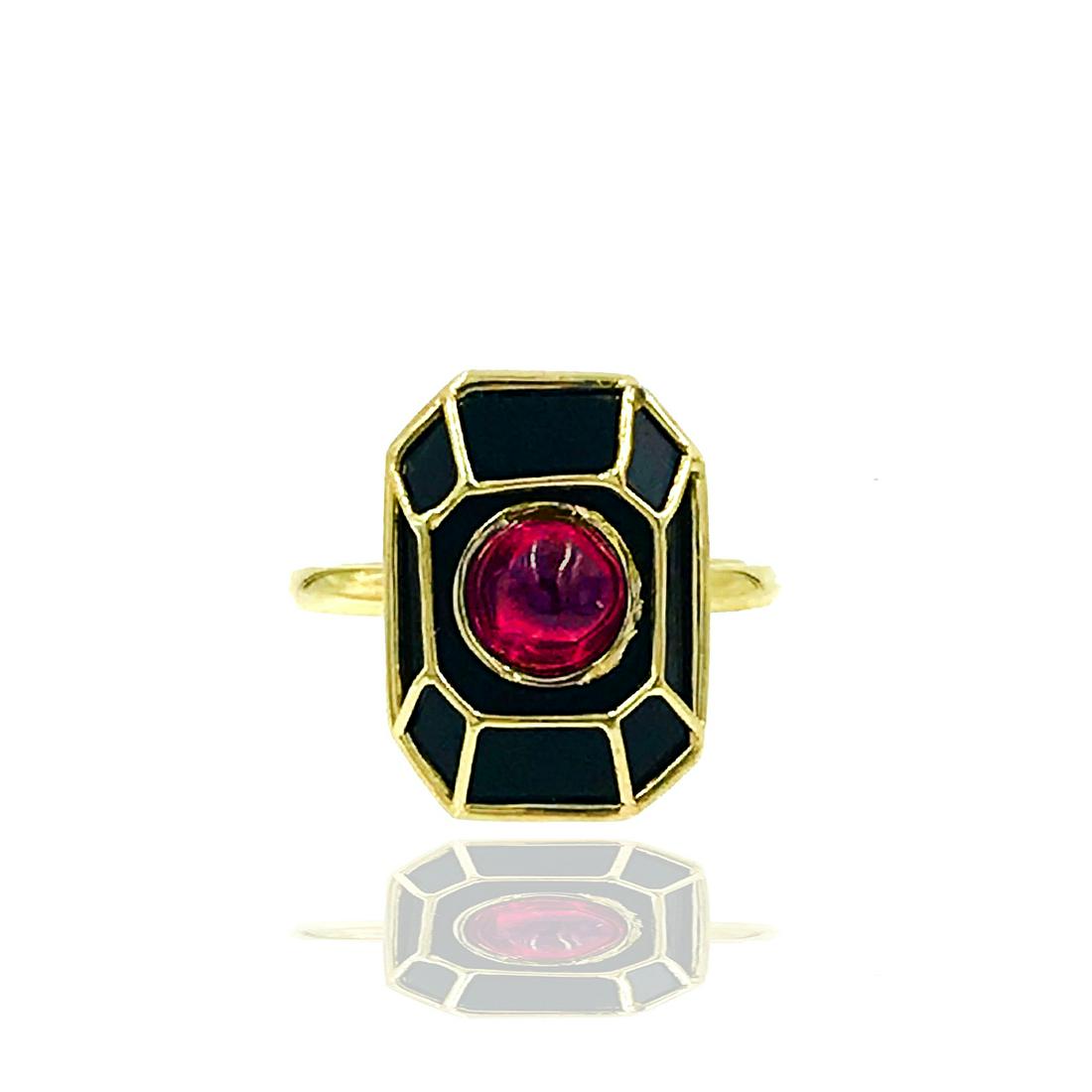 Black Onyx Gothic Ring with Red Cabochon Stone: Retail: $1399 14 Karat yellow gold, Gothic styled ring weighing 5.3 grams of gold with gold over a base of black onyx. The ring is finger size 6.5. This ring measures ? inches in length and Ã‚Â« 