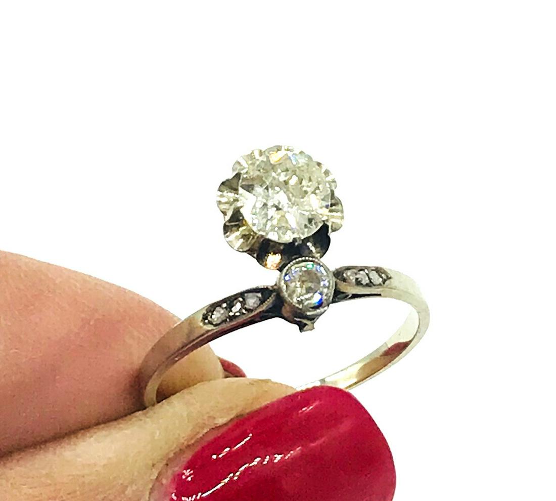 Circa 1800, Solitaire Mine Cut w/ Accents, !.00 CTW: Circa 1800, Solitaire Mine Cut w/ Accents, !.00 CTW Ring. Single 6.15 mm mine cut, antique diamond is set in an illusion style setting. Quality of the diamond is I1 clarity and is approximately .85 ca