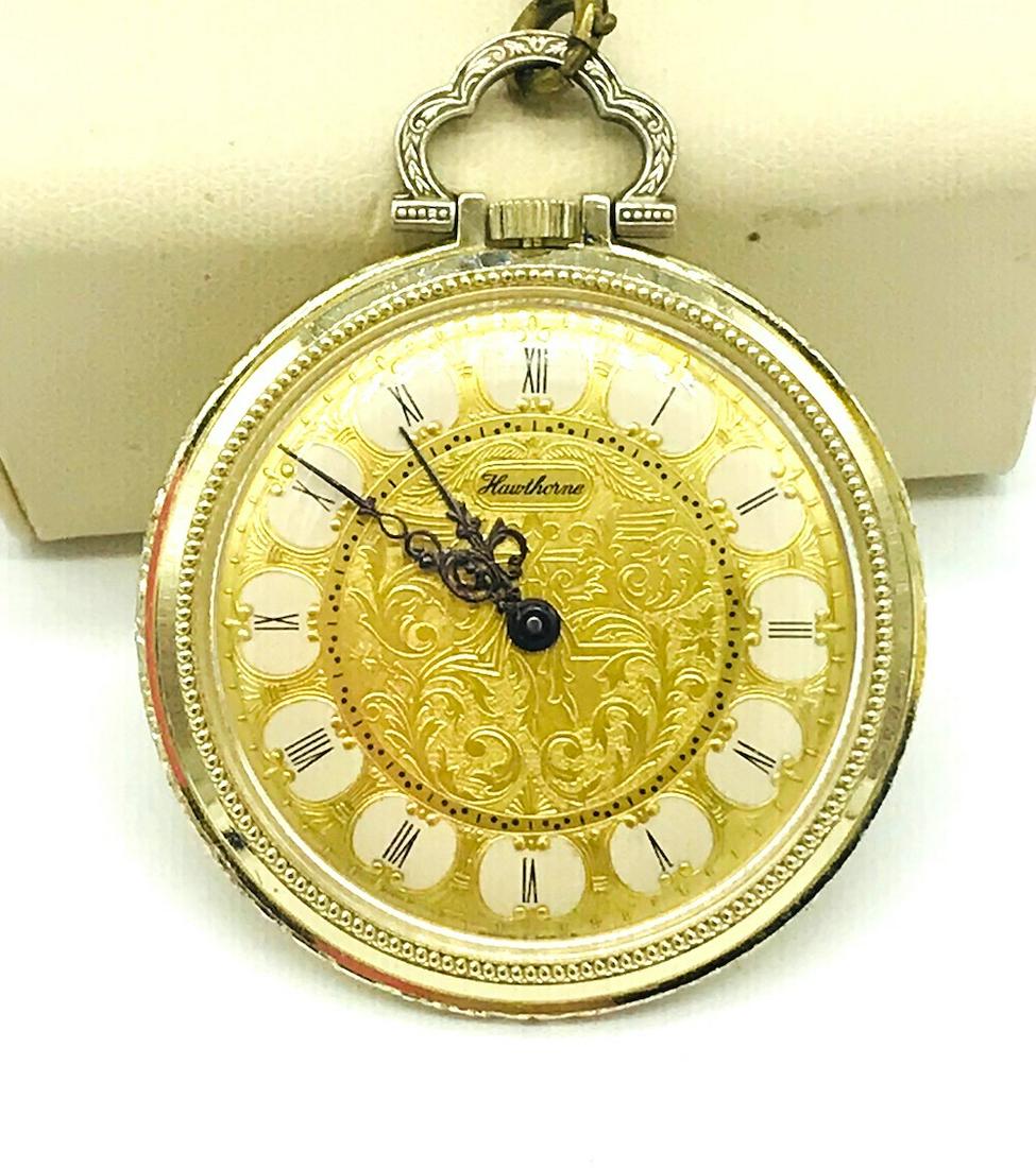 Swiss Hawthorne, Manual Wind 41 mm Pocket watch,: Hawthorne, Manual Wind 41 mm Pocket watch, Antique Chain Swiss made, manual wind-working movement. Gold coated case measures 41 mm. Porcelain dial markers 24 Inch antique link chain GIA Gemologist Ins