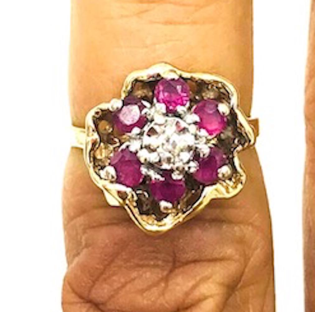 Organic Style Ruby Cluster, Diamonds, .65 CTW,: Cluster, Ruby and Diamond 18Kt. Gold Ring Nugget style outside enclosure with cluster center. (1) round diamond is 2.06 mm, weight of .06 carat set to appear as a 1/4 CT in illusion setting. Outside (