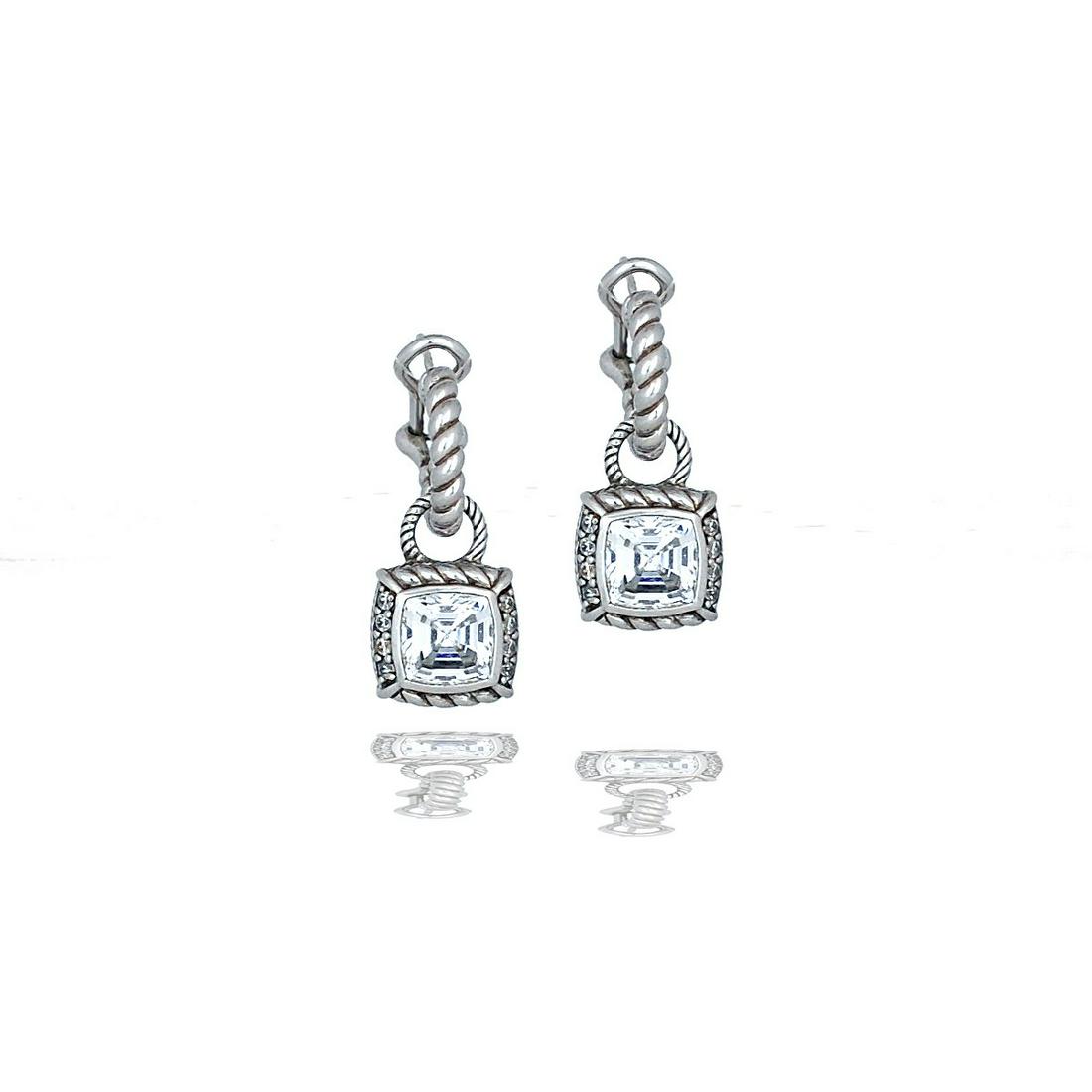 Judith Ripka Sterling Silver Huggee Halo Earrings: Judith Ripka Sterling Silver Huggee Halo Earrings Judith Rivka earrings are set with cushion cut cubic zirconia stones set in a bezel halo with surrounding stones and rope texture Hinged huggee rope