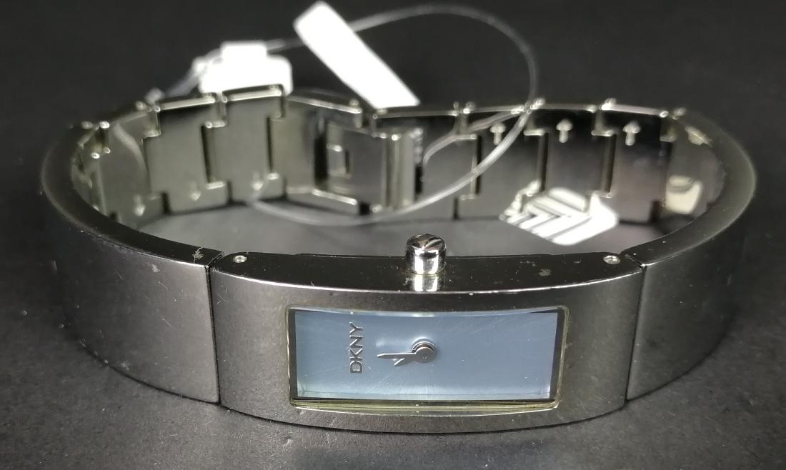 LADIES' DKNY QUARTZ WRISTWATCH, ref NY-3252, 13mm: LADIES' DKNY QUARTZ WRISTWATCH, ref NY-3252, 13mm rectangular stainless steel case, silver dial, bracelet, currently not running - may require a new battery.