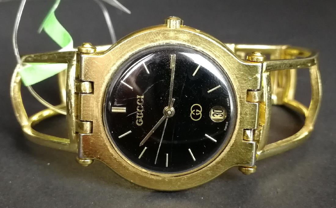 MID SIZE GUCCI WRISTWATCH, circular black dial with (1 of 1)