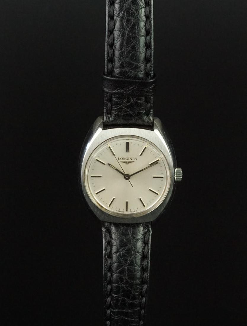 GENTLEMEN'S LONGINES REF. 1584, CAL. 6942, MANUALLY: GENTLEMEN'S LONGINES REF. 1584, CAL. 6942, MANUALLY WOUND VINTAGE DRESS WRISTWATCH, circular white dial with sword hands, straight applied baton indicies, minute track on outer edge of dial, applied L