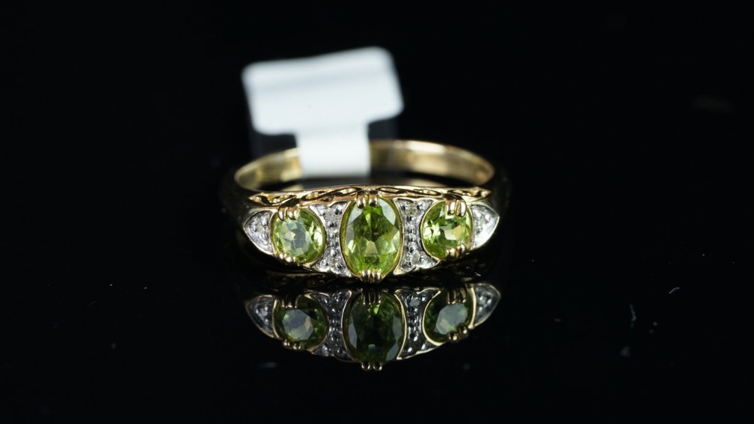 Peridot and diamond ring, mounted in hallmarked 9ct (1 of 2)