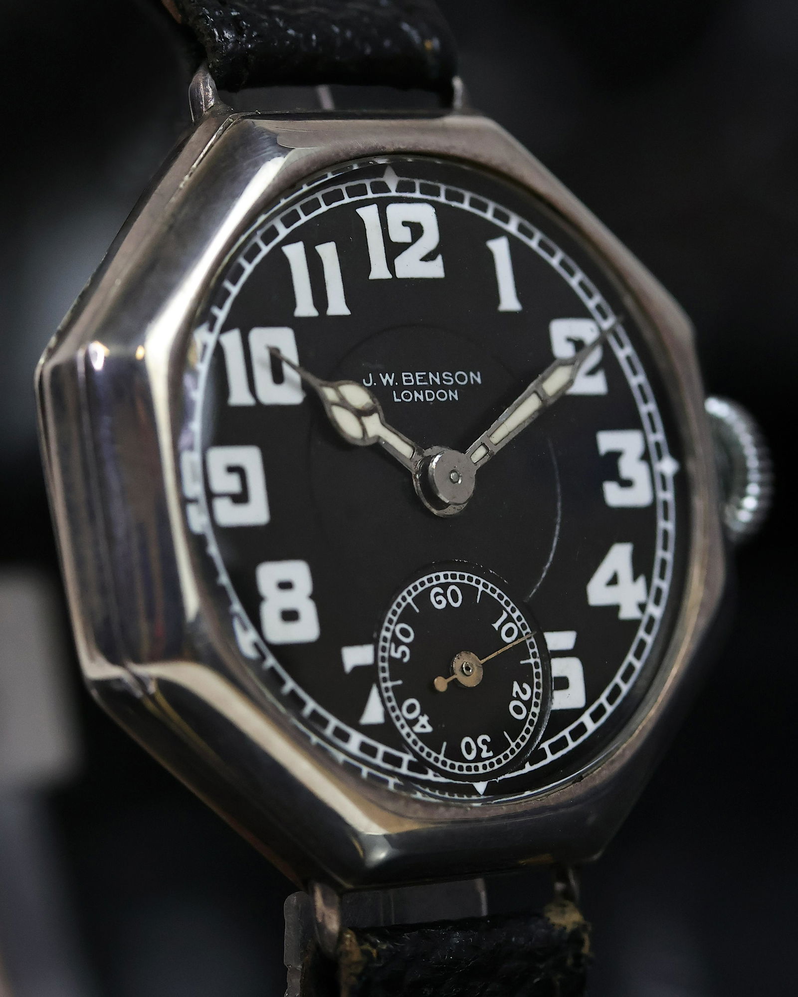 RARE J.W. BENSON 925 SILVER OCTAGONAL WRISTWATCH CIRCA 1918, circular black dial with arabic numeral: RARE J.W. BENSON 925 SILVER OCTAGONAL WRISTWATCH CIRCA 1918, circular black dial with arabic numeral hour markers, cathedral hands, subsidiary seconds at 6 o'clock, 32mm 925 silver case, black leather