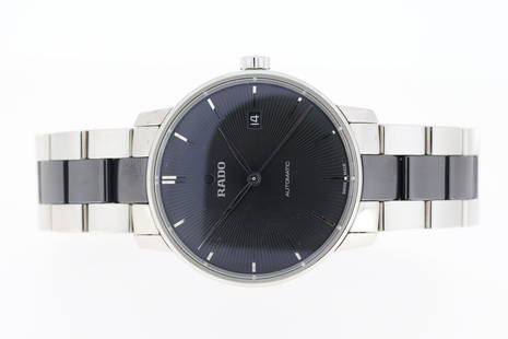 Brand: Rado Model Name: Coupole Reference: 763.3860.4 Complication: Date Movement: Automatic Box:: Brand: Rado Model Name: Coupole Reference: 763.3860.4 Complication: Date Movement: Automatic Box: Yes Dial shape: Circular Dial colour: Textured, Black Dial features: Silver hands and baton hour