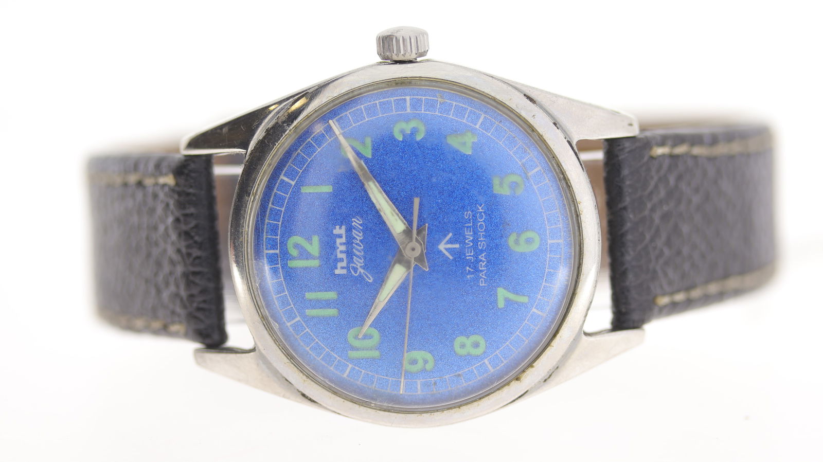 HMT Gawan Manual Wind: Brand: HMT Model Name: Gawan Movement: Manual Wind Dial shape: Circular Dial colour: Blue Dial features: Chapter ring, Arabic numerals Bezel: Smooth Case size: 34mm Case material: Nickel Case back mat