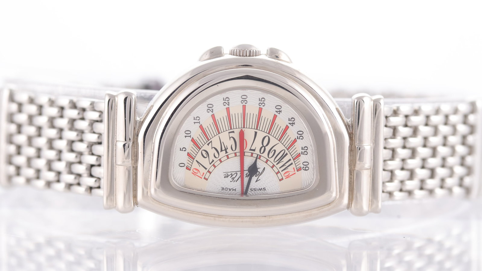 Jean d'Eve Sectora Retrograde Quartz Circa 2000's: Brand: Jean d'Eve Model Name: Sectora Movement: Quartz Year: Circa 2000's Dial shape: Asymmetrical Tonneau Dial colour: Silver Dial features: Sideways 'speedometer' style dial with double retrograde, 