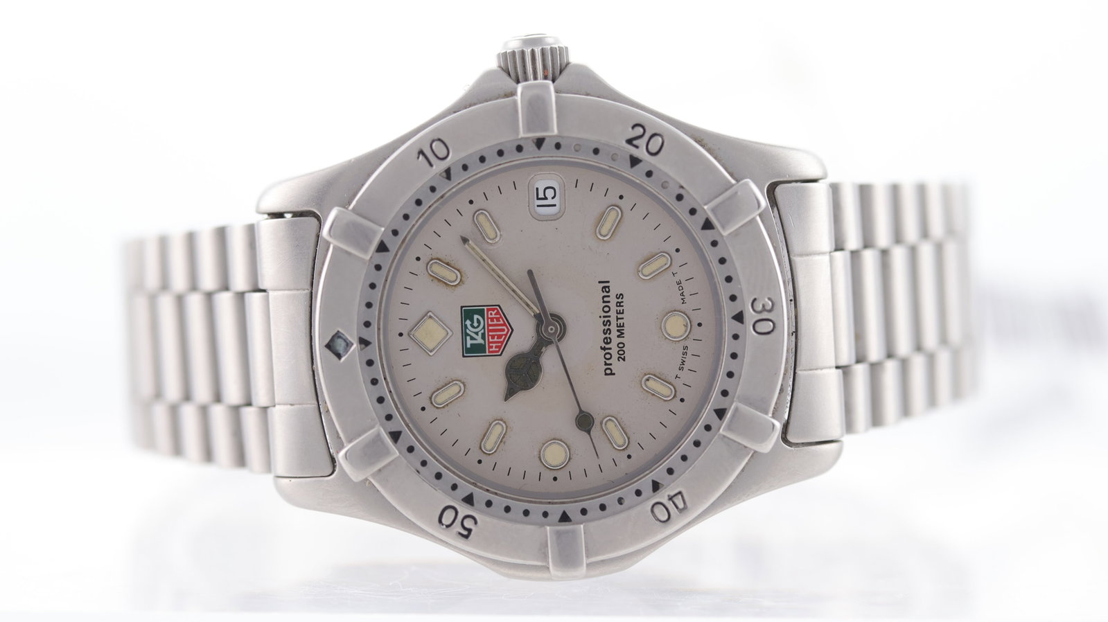 Tag Heuer Professional Date Quartz Ref WE1211-R: Brand: Tag Heuer Model Name: Professional Reference: WE1211-R Movement: Quartz Dial shape: Circular Dial colour: Grey Dial features: Silver/lume hands and hour markers. Date aperture at 3 o'clock Beze