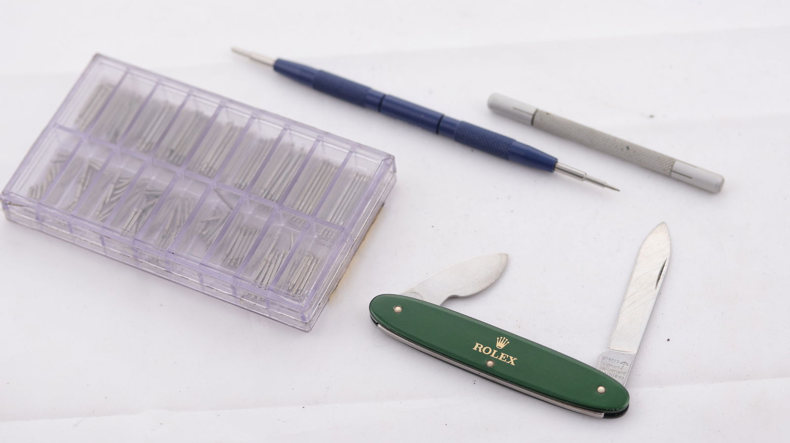 Rolex & Breitling tools (some have end pin broken), Rolex pocket knife + assorted spring bars: Rolex & Breitling tools (some have end pin broken), Rolex pocket knife + assorted spring bars