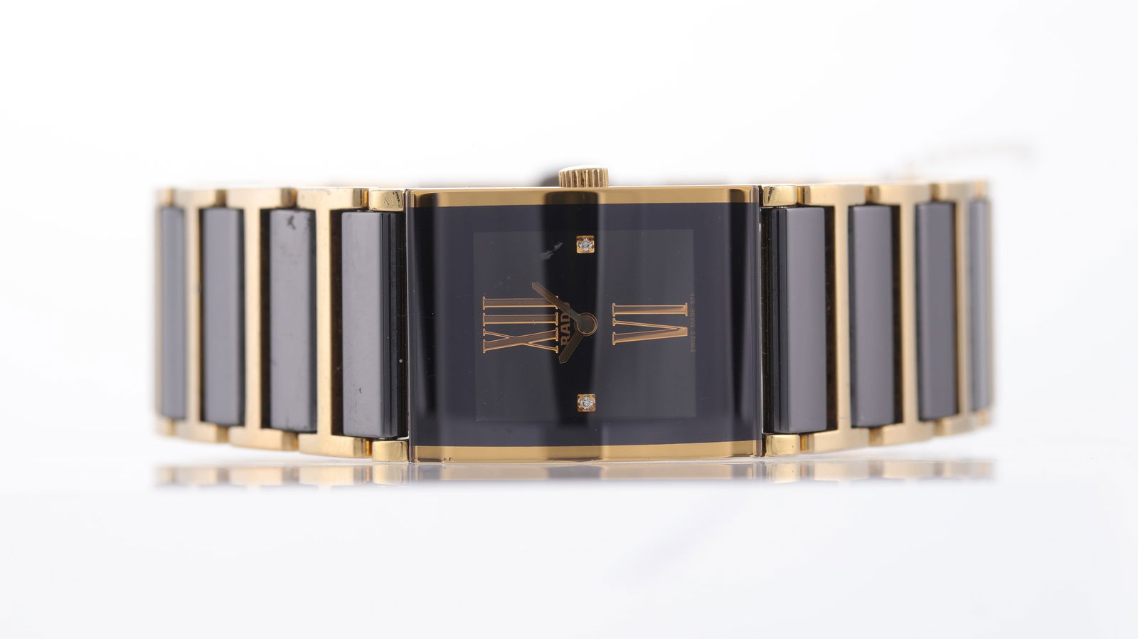 Rado Jubile Ref 153.0789.3: Brand: Rado Model Name: Jubile Reference: 153.0789.3 Movement type: Quartz Dial shape: Rectangular Dial colour: Black Dial features: dial with 2 diamonds, large Roman numeral 12 + 6 Case