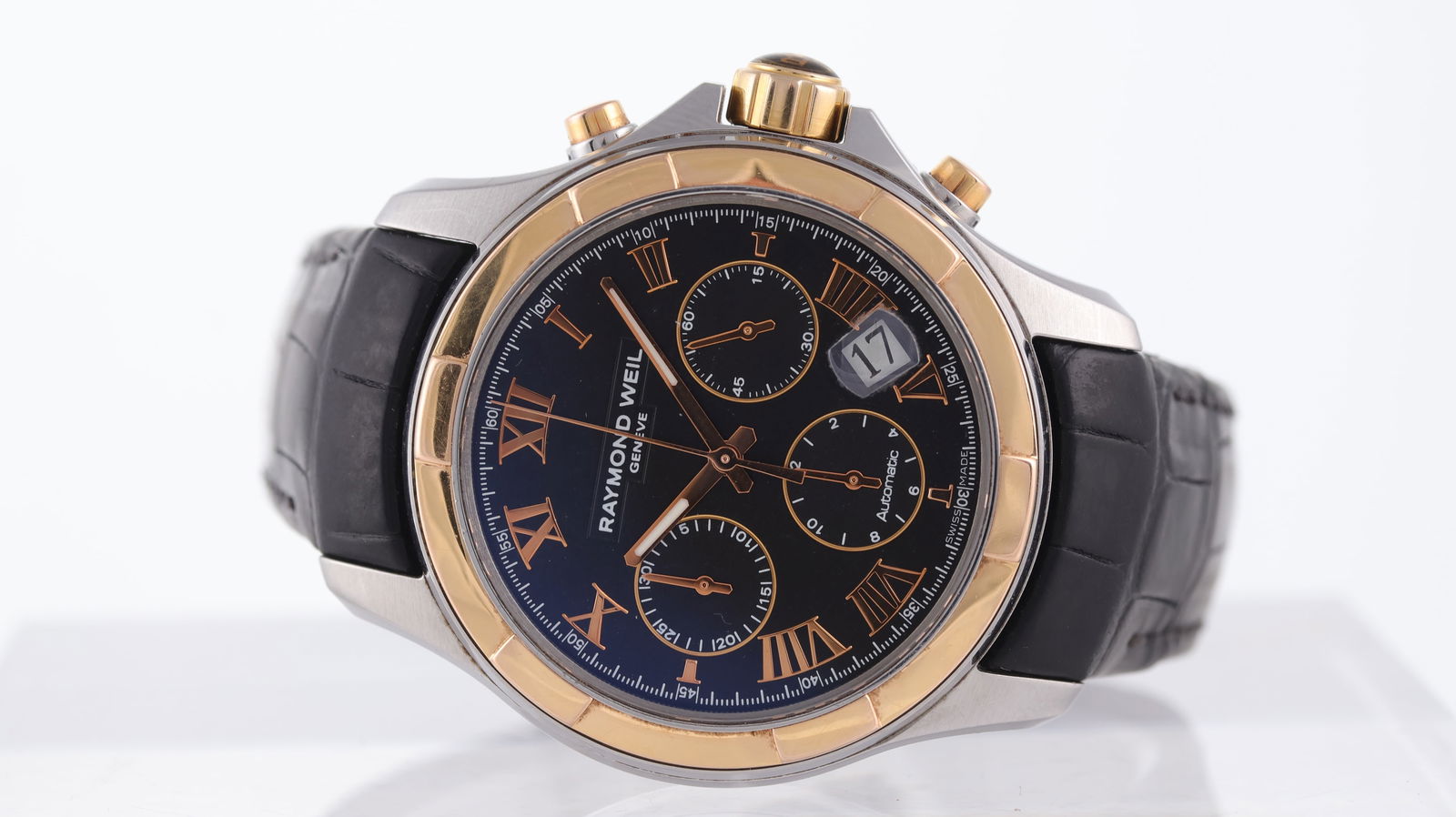 Raymond Weil Parsifal Ref 7260: Brand: Raymond Weil Model Name: Parsifal Reference: 7260 Movement type: Automatic Movement calibre: Raymond Weil 7310 Dial shape: Circular Dial colour: Black Dial features: Rose Roman numeral