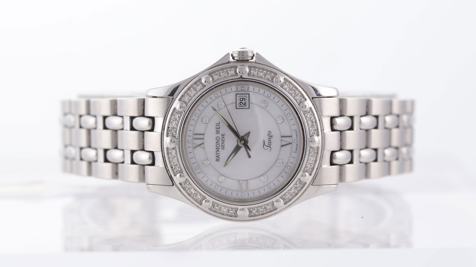 Raymond Weil Tango Ref 5390: Brand: Raymond Weil Model Name: Tango Reference: 5390 Movement type: Quartz Dial shape: Circular Dial colour: White Dial features: Stone set hour markers, date aperture at 3 o'clock Bezel: