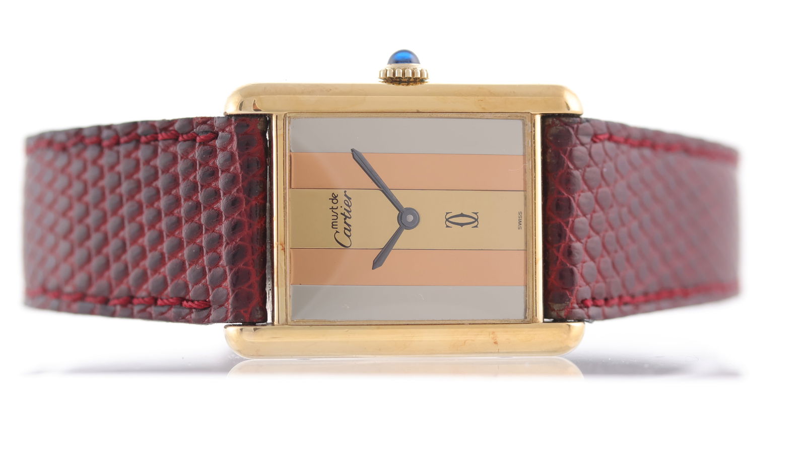 Cartier Must De Cartier Tank 'Trinity Dial' Manual Wind Circa 1980's: Brand: Cartier Model Name: Must De Cartier Tank Movement type: Manual Wind Year: Circa 1980's Dial shape: Rectangular Dial colour: Tri-colour Dial features: Trinity dial Case size: 23.5mm Case materia