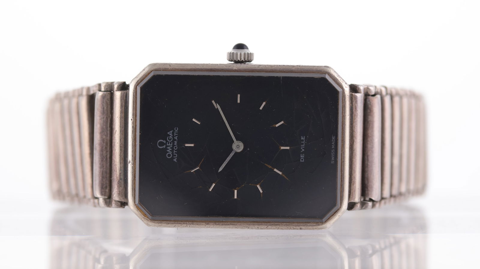 Vintage Omega De Ville Automatic 925 Silver 'Spider Dial' Circa 1975: Brand: Omega Model Name: De Ville Reference: 8400 Movement type: Automatic Movement calibre: Omega 663 Year: Circa 1975 Dial shape: Rectangular Dial colour: Black Dial features: Spider dial effect wit