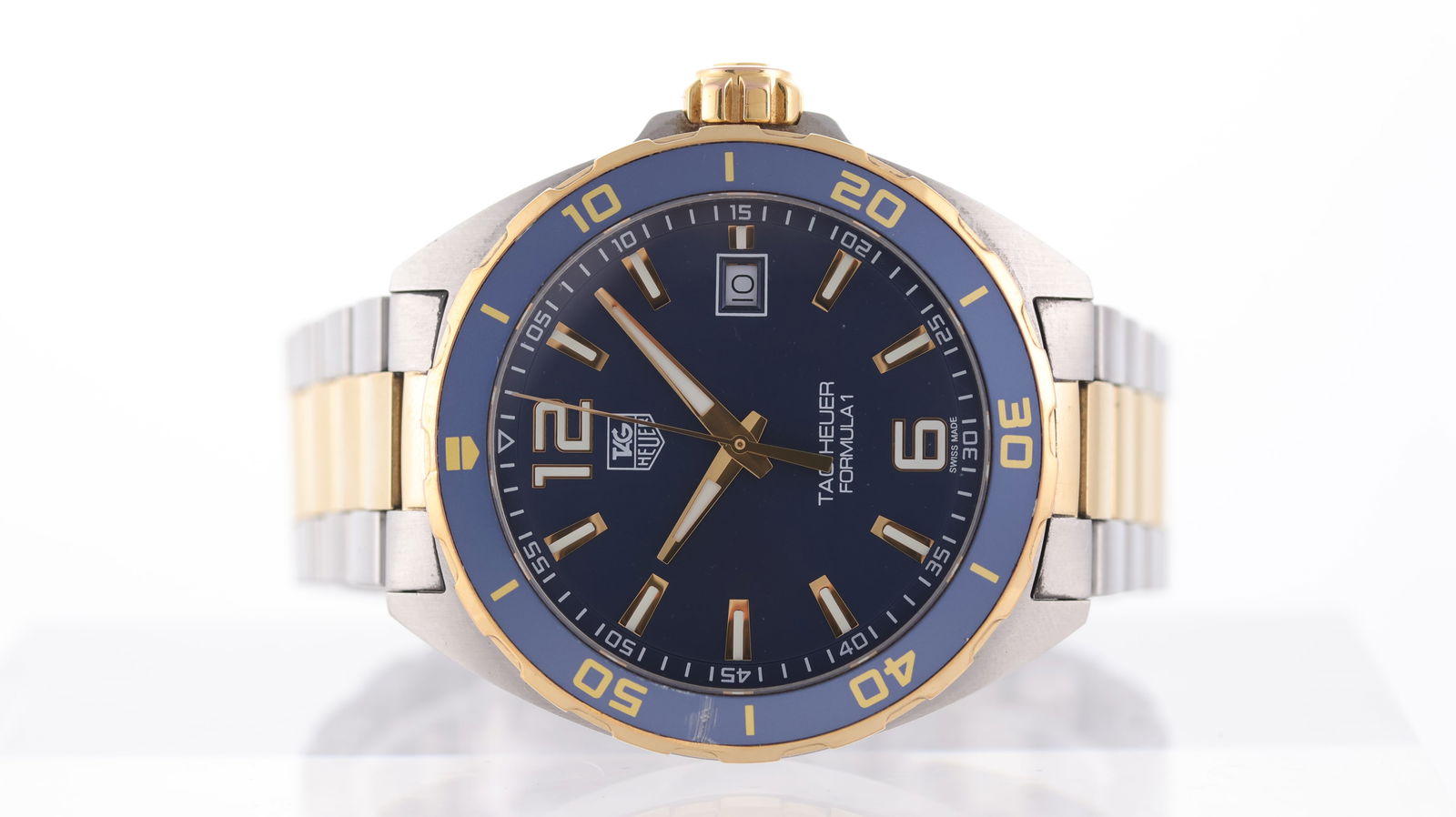 Tag Heuer Formula 1 Date Ref WAZ1120 with Box and Papers 2018: Brand: Tag Heuer Model Name: Formula 1 Reference: WAZ1120 Movement type: Quartz Year: 2018 Box: Full Box Papers: Full Set Papers Dial shape: Circular Dial colour: Blue Dial features: Sunburst dial wit