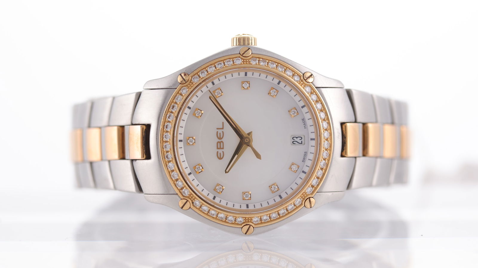 Ebel Classic Sport Diamond Set Ref E1953Q2S: Brand: Ebel Model Name: Classic Sport Reference: E1953Q2S Movement type: Quartz Dial shape: Circular Dial colour: Mother of Pearl Dial features: Diamond dot hour markers, Quick set date aperture at 6