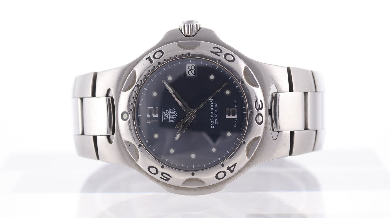 Tag Heuer Kirium Ref WL111F: Brand: Tag Heuer Model Name: Kirium Reference: WL111F Movement type: Quartz Dial shape: Circular Dial colour: Sunburst, Blue Dial features: Applied hour markers. Date aperture at 3 o'clock. Bezel: Uni