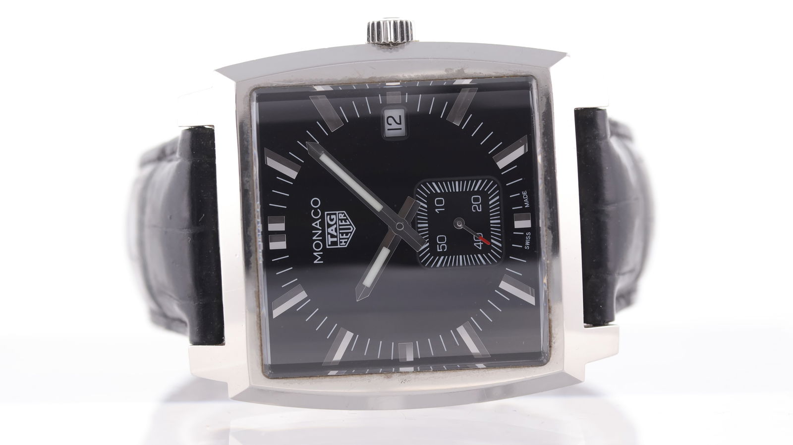 Tag Heuer Monaco Ref WAW131A with Box and Papers 2017: Brand: Tag Heuer Model Name: Monaco Reference: WAW131A Movement type: Quartz Year: 2017 Box: Full Box Papers: Full Set Papers Dial shape: Square Dial colour: Black Dial features: Silver hands and appl