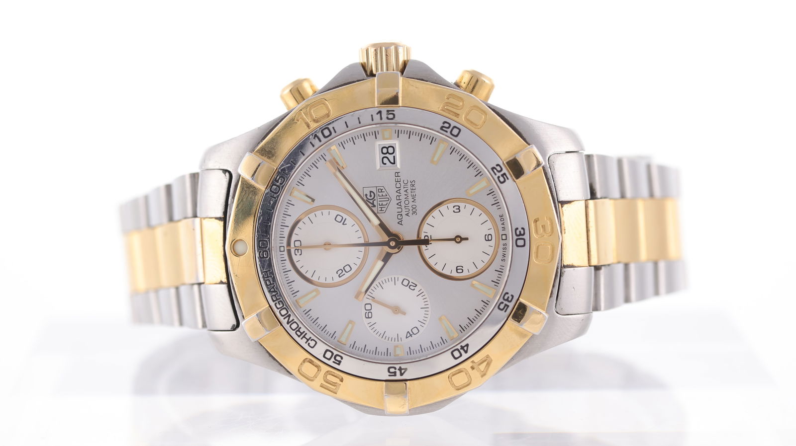 Tag Heuer Aquaracer Chronograph Ref CAF2120: Brand: Tag Heuer Model Name: Aquaracer Chronograph Reference: CAF2120 Movement type: Automatic Movement calibre: ETA 7750 Dial shape: Circular Dial colour: Silver Dial features: Three subsidiary dials