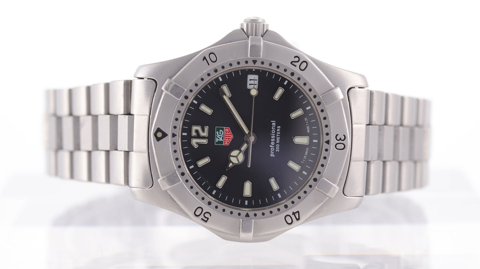 Tag Heuer Professional 2000 Ref WK1110-0: Brand: Tag Heuer Model Name: Professional 2000 Reference: WK1110-0 Movement type: Quartz Dial shape: Circular Dial colour: Black Dial features: Silver/Lume hands and hour markers. Date aperture at 3 o