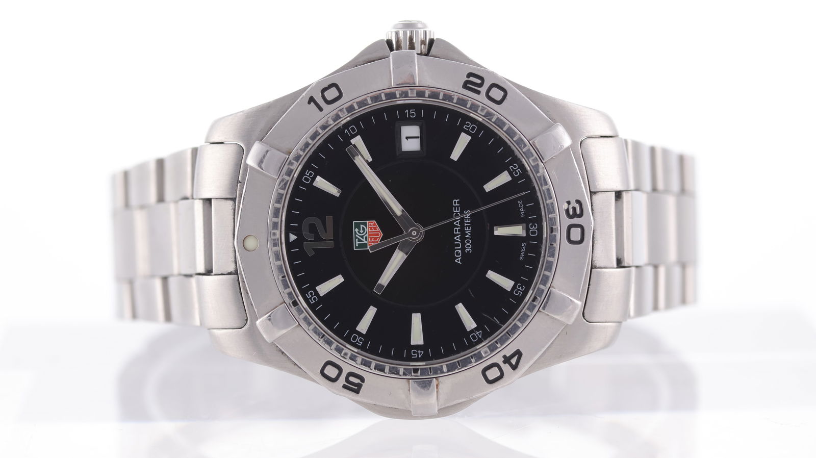 Tag Heuer Aquaracer Ref WAF1110: Brand: Tag Heuer Model Name: Aquaracer Reference: WAF1110 Movement type: Quartz Dial shape: Circular Dial colour: Black Dial features: Silver/Lume hands and hour markers. Date aperture at 3 o'clock. B