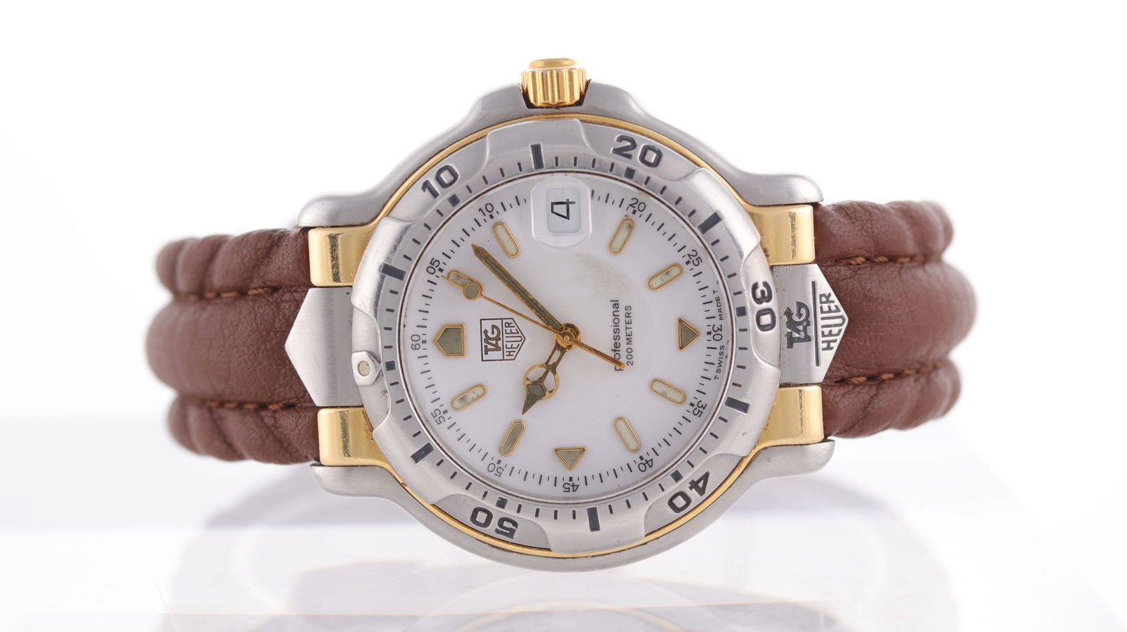 Tag Heuer Professional 6000 Ref WH1151-K1: Brand: Tag Heuer Model Name: Professional 6000 Reference: WH1151-K1 Movement type: Quartz Dial shape: Circular Dial colour: White Dial features: Mercedes hands with applied hour markers. Date aperture