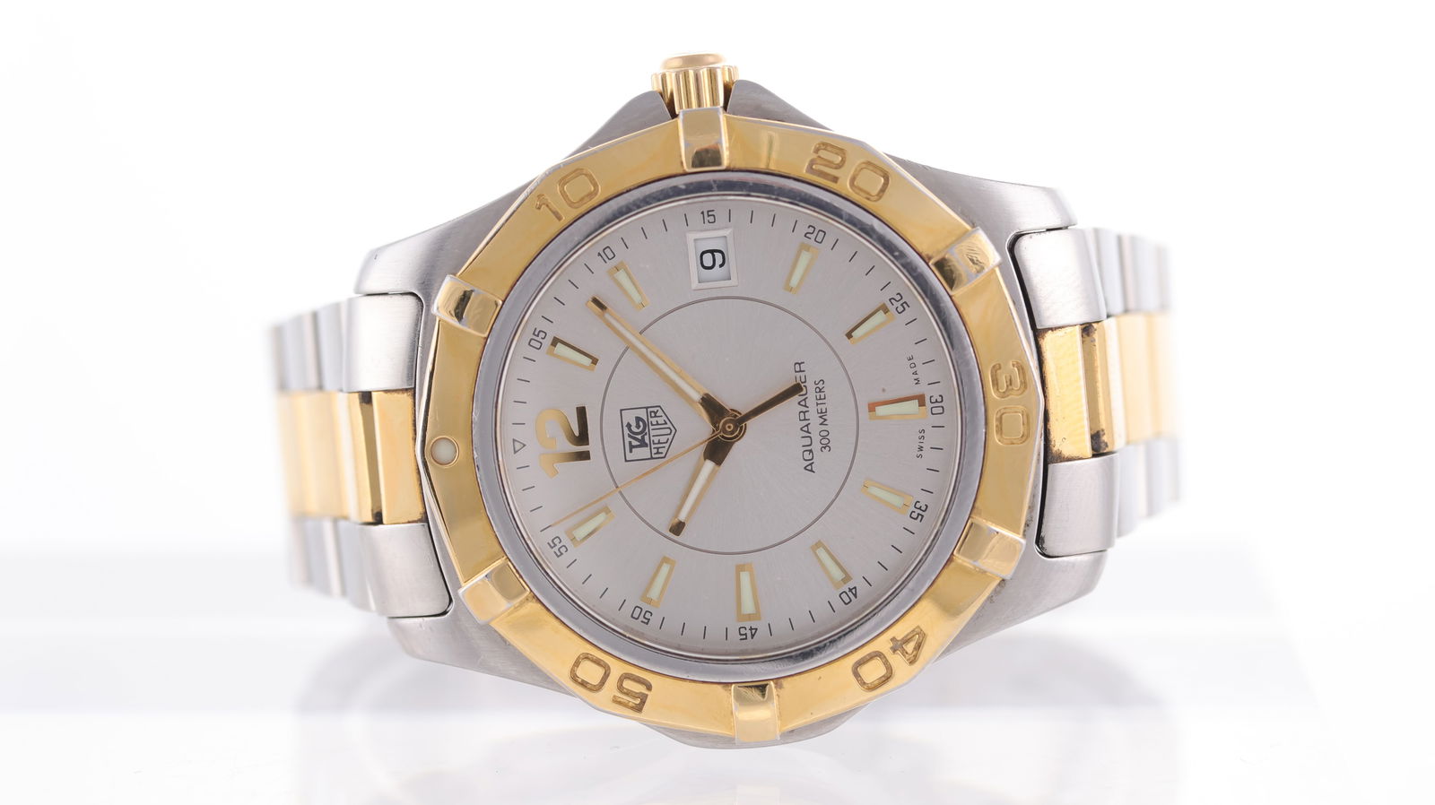 Tag Heuer Aquaracer Ref WAF1120: Brand: Tag Heuer Model Name: Aquaracer Reference: WAF1120 Movement type: Quartz Dial shape: Circular Dial colour: Sunburst, Silver Dial features: Lume filled hands and trapezoid hour markers. Date ape