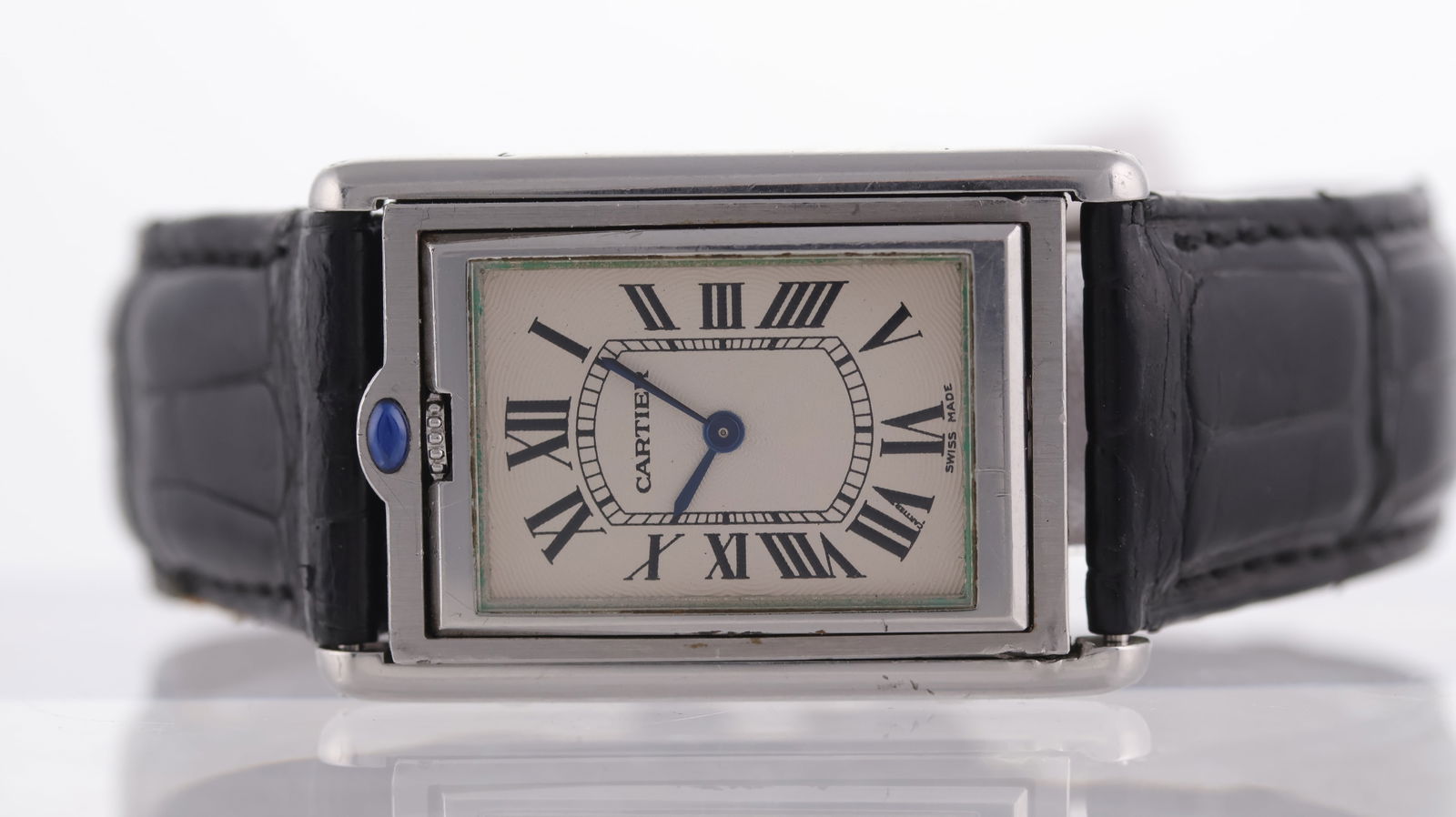 Cartier Tank Basculante manual wind Ref 2390: Brand: Cartier Model Name: Tank Basculante Reference: 2390 Movement type: Manual Wind Dial shape: Rectangular Dial colour: Cream Dial features: Arabic numerals Case size: 26mm Case material: Stainless