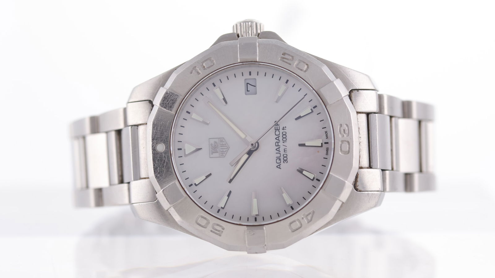 Tag Heuer Aquaracer Ref WAY1312: Brand: Tag Heuer Model Name: Aquaracer Reference: WAY1312 Movement type: Quartz Dial shape: Circular Dial colour: Mother of Pearl Dial features: Dot diamond hour markers. Date aperture at 3 o'clock. B