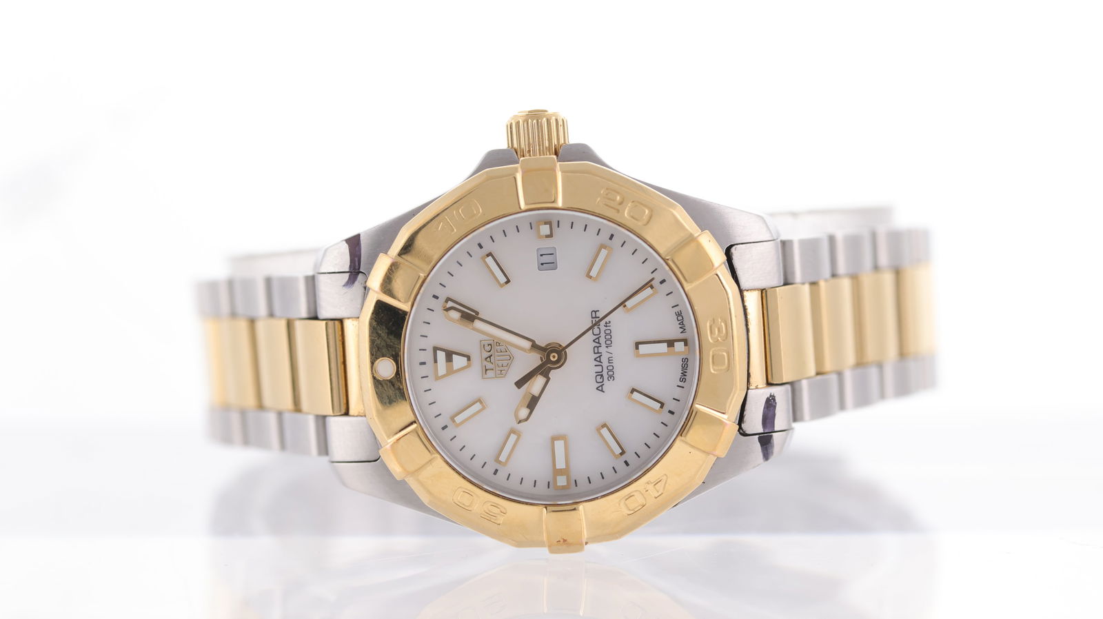 Tag Heuer Aquaracer Ref WBD1420: Brand: Tag Heuer Model Name: Aquaracer Reference: WBD1420 Movement type: Quartz Dial shape: Circular Dial colour: Mother of Pearl Dial features: Gold/Lume hands and baton hour markers. Date aperture a