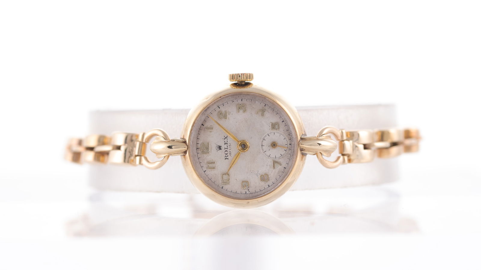 Ladies Rolex Dress Watch 9ct Gold Circa 1954: Brand: Rolex Model Name: Dress Watch Movement type: Manual Wind Year: Circa 1954 Dial shape: Circular Dial colour: White Dial features: Arabic numerals, subsidiary seconds Case size: 21.5mm Case mater
