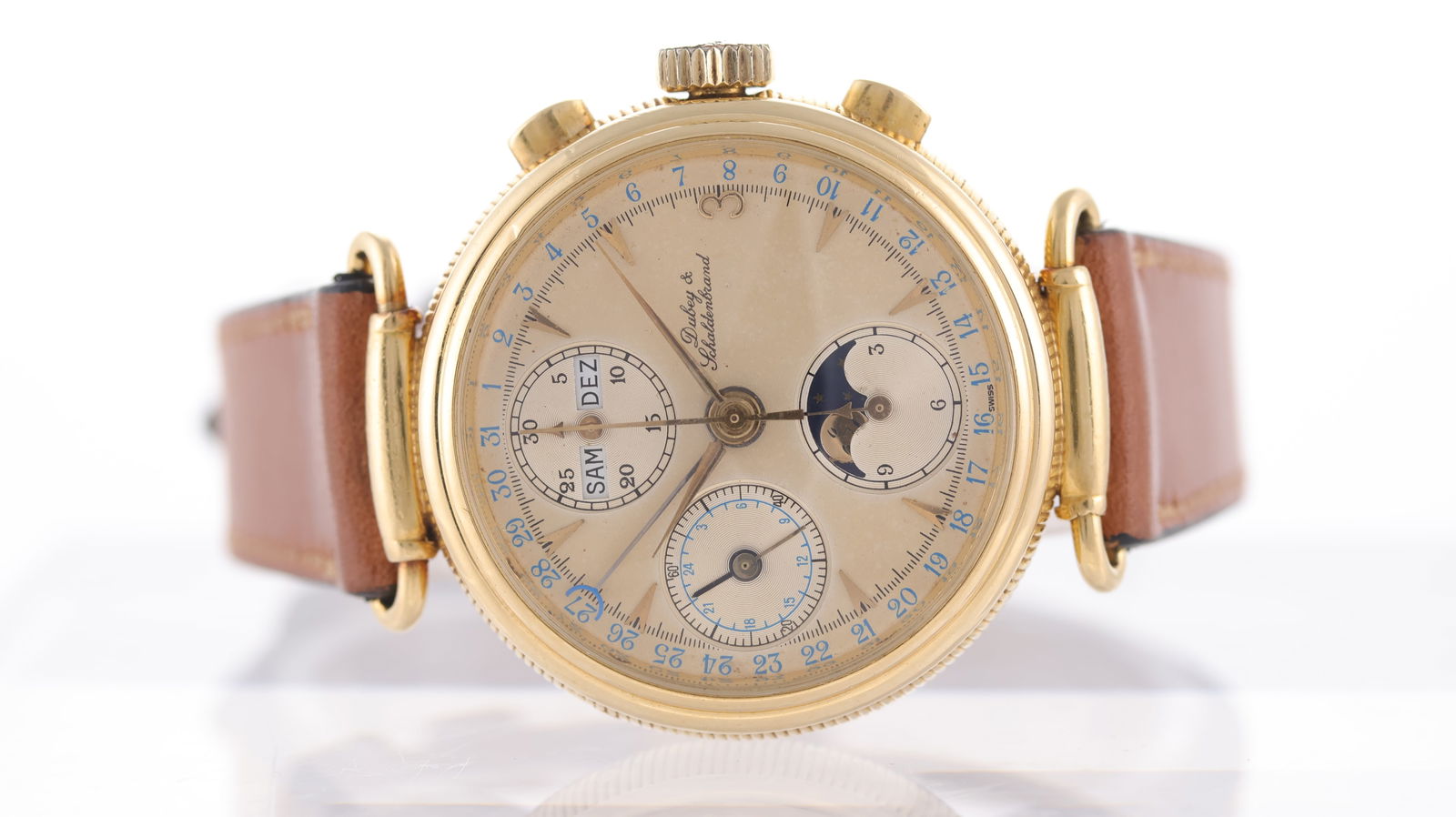 Dubey & Schaldenbrand Triple Calendar Moonphase 18ct yellow gold Circa 1980's: Brand: Dubey & Schaldenbrand Model Name: Triple Calendar Moonphase Movement type: Automatic Movement calibre: Valjoux 7750 Movement features: Modified/decorated movement Year: Circa 1980's Dial shape: