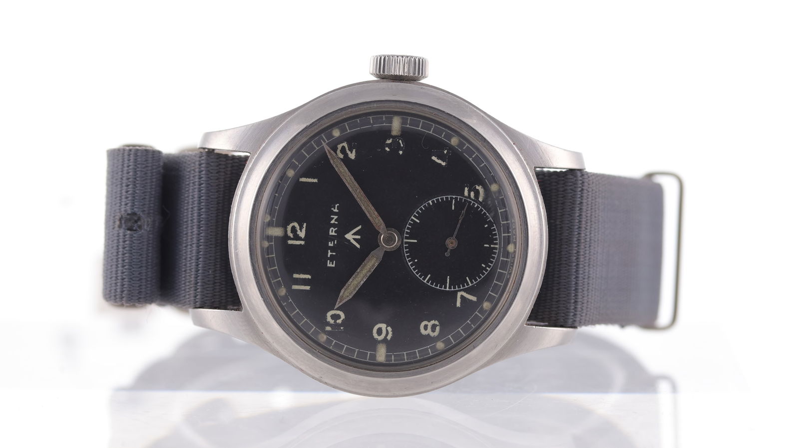 Vintage Eterna Dirty Dozen WWII Military Watch Circa 1945: Brand: Eterna Model Name: Dirty Dozen Movement type: Manual Wind Movement calibre: Eterna 520 Year: Circa 1945 Dial shape: Circular Dial colour: Black Dial features: Original Eterna military dial with