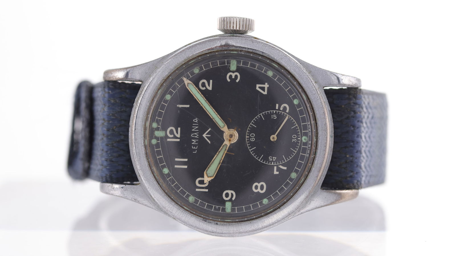 Vintage Lemania Dirty Dozen WWII Military Watch Circa 1945: Brand: Lemania Model Name: Dirty Dozen Movement type: Manual Wind Movement calibre: Lemania 27A Year: Circa 1945 Dial shape: Circular Dial colour: Black Dial features: Original Lemania military dial w