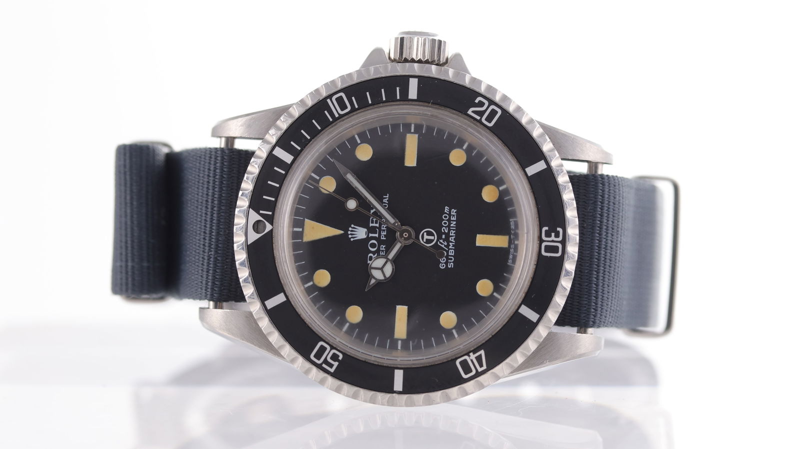 Rare Rolex Submariner 'Milsub' Royal Navy Military Diver Reference 5513 Circa 1975: Brand: Rolex Model Name: Submariner 'Milsub' Reference: 5513 Movement type: Automatic Movement calibre: Rolex 1520 Year: 1975 Dial shape: Circular Dial colour: Black Dial features: Circle T tritium di