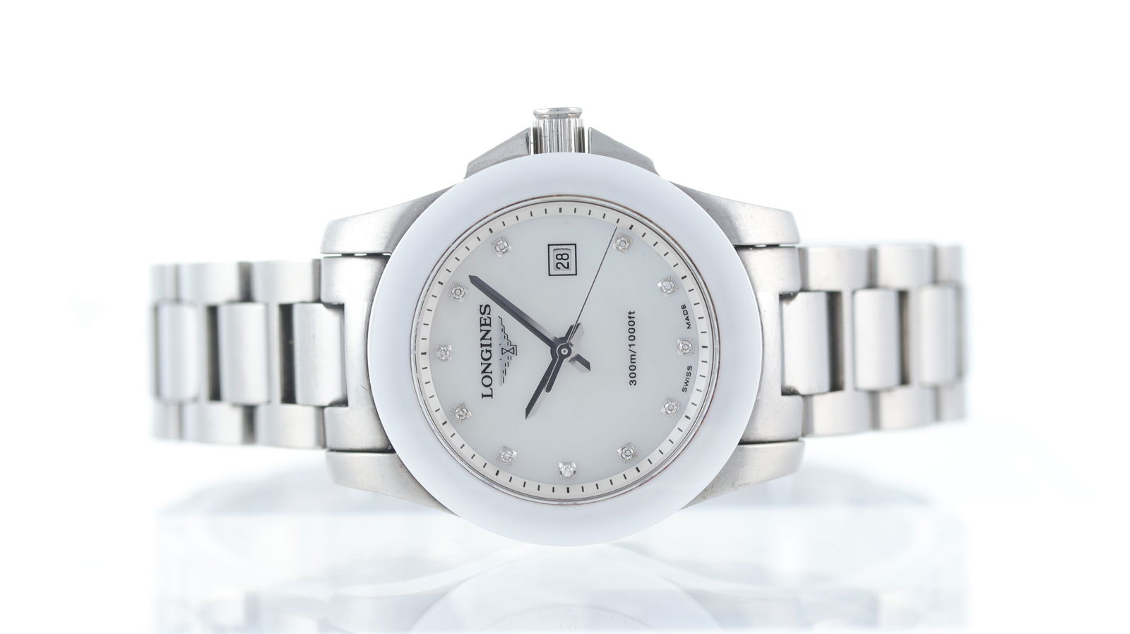 Longines Conquest Ref L3.257.4 Mother of Pearl: Brand: Longines Model Name: Conquest Reference: L3.257.4 Movement type: Quartz Dial shape: Circular Dial colour: White mother of pearl Dial features: Diamond hour markers, quickset date